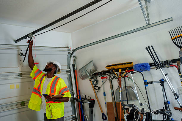 Professional Garage Door Panel Replacement technician working in Baidland, PA